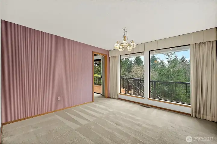 Step up from the living room into the big dining room.  Are you imagining your first dinner party so far?  Cocktails (or mocktails) in the living room until dinner is served.  Of course, the windows offer the same view as the living room.