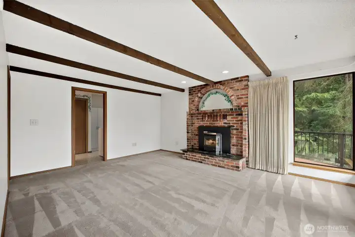 The family room also offers access to the laundry room, and an entrance to the kitchen (not seen here).