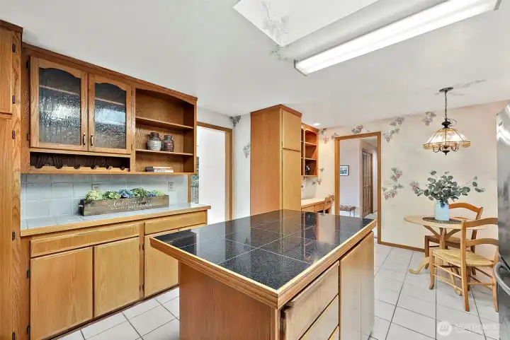 The kitchen is a pretty good size, offering ample counter space and plenty of cabinets.