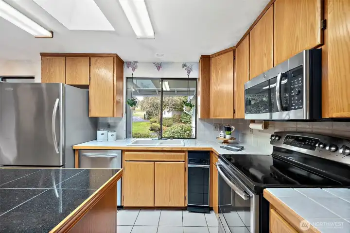 Stainless appliances are among the improvements made in this home since it was built.