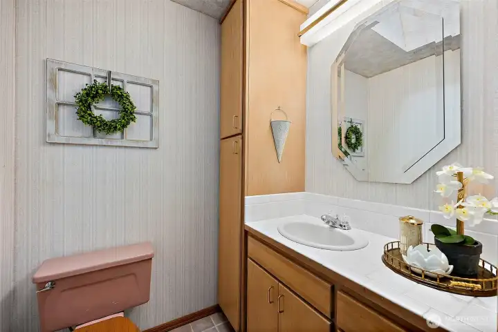 The 3/4 primary bath is pretty standard with what I'll describe as a "full" walk-in shower.  What do I mean by that?  Ask me.  :)