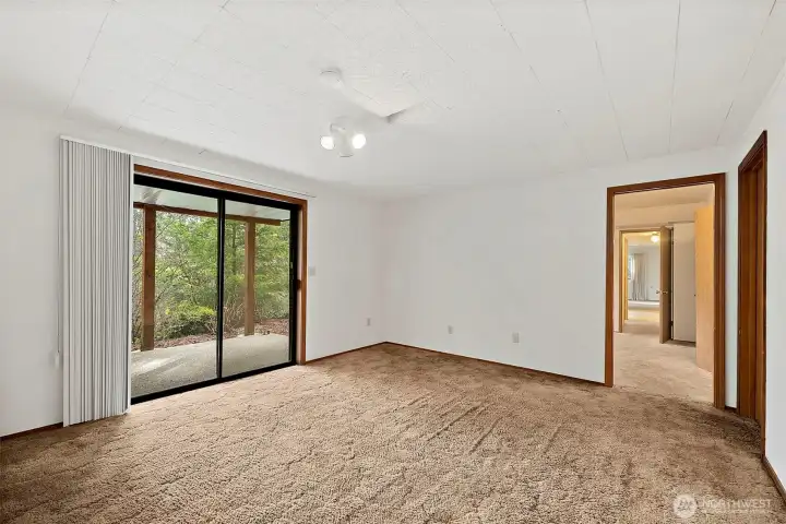 We think that the good sized living space downstairs with its own entrance and a kitchen and what is obviously a good bedroom area suggest an in-law apartment, or maybe a tenant would enjoy the space.  It really is comfortable.  And I dare say that's not just my opinion.  Your choice!  How would you use each room?