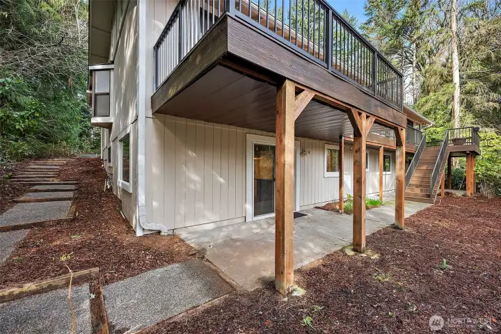 A little bit of outdoor living on the lower level of the property.