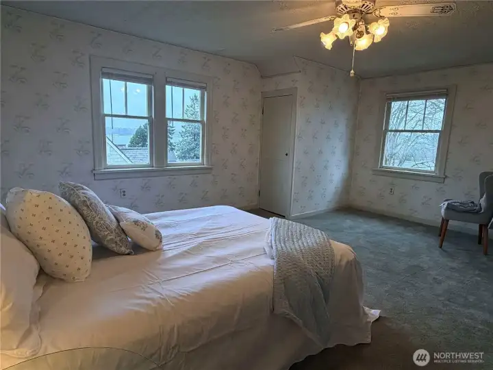 Upstairs bedroom with view of the shipyard and ferry