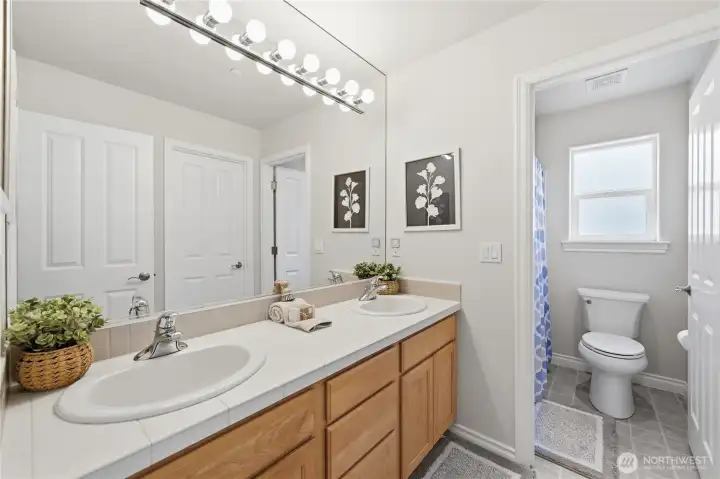 Full Bath attached to 2nd bedroom & Hallway