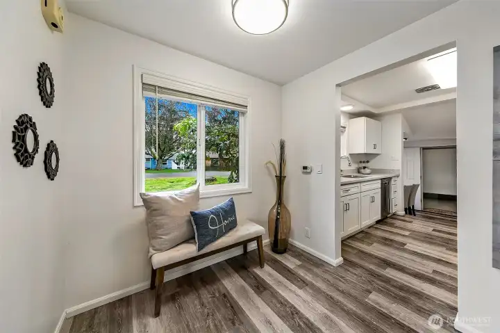 A welcoming entry creates a natural transition between the living spaces and kitchen.