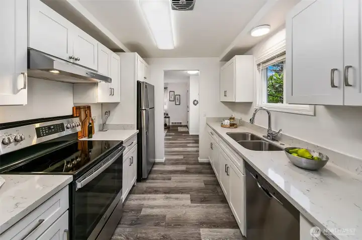 A bright and efficient galley layout balances everyday function with clean modern finishes.