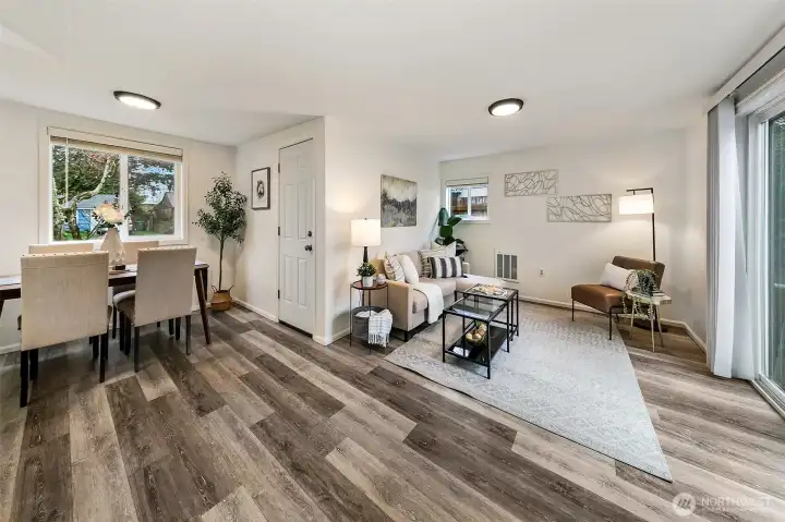 Thoughtful layout creates easy flow between living, dining, and kitchen spaces.