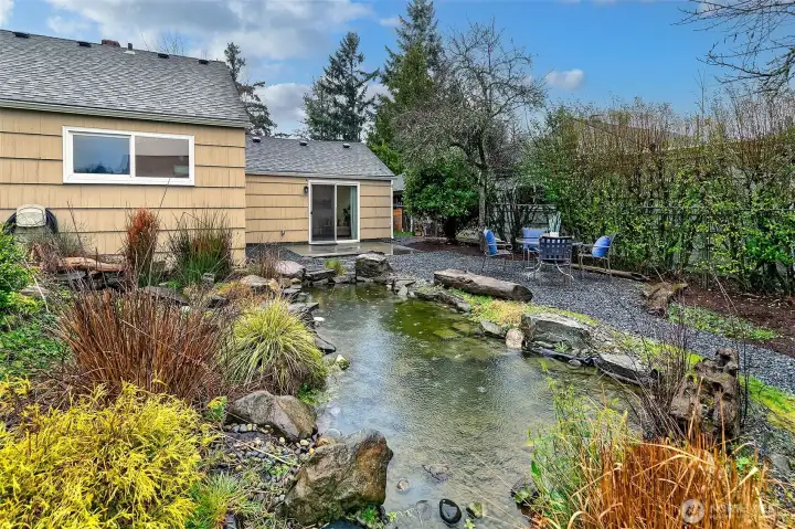 Evening light and southern exposure bring warmth to this peaceful, private backyard garden setting.