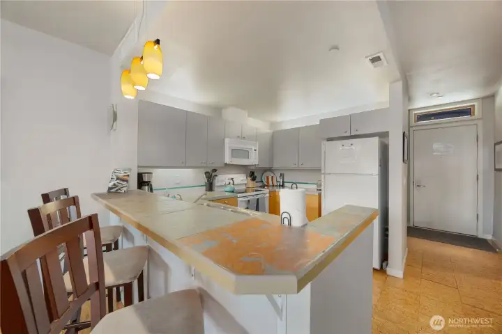 Bar seatting off of kitchen