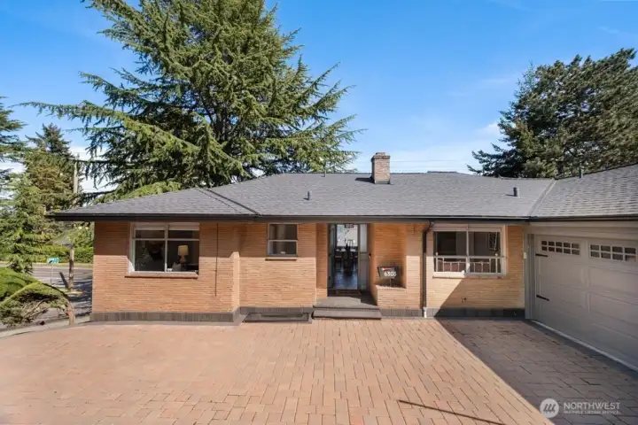 New roof and gutters with newer paver driveway, walkways & patio
