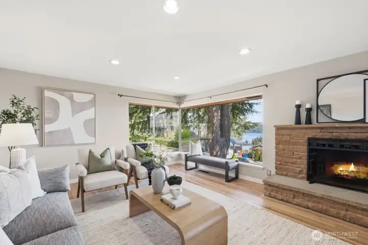 Light-filled living and dining rooms showcase incredible expansive views