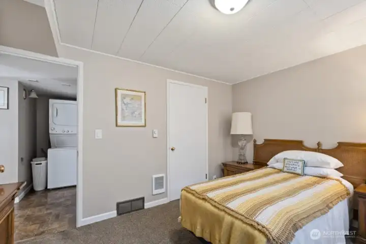 Rental bedroom and washer and dryer nook