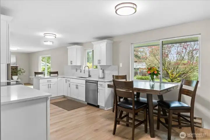 Updated flooring throughout the main living areas in 2023 helps create flow in the home.