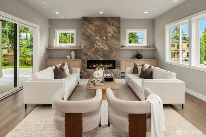 Dramatic gas fireplace with built-in cabinets. Wired for mounted TV or a beautiful piece of art. Dramatic gas fireplace with built-in cabinets. Wired for mounted TV or a beautiful piece of art.