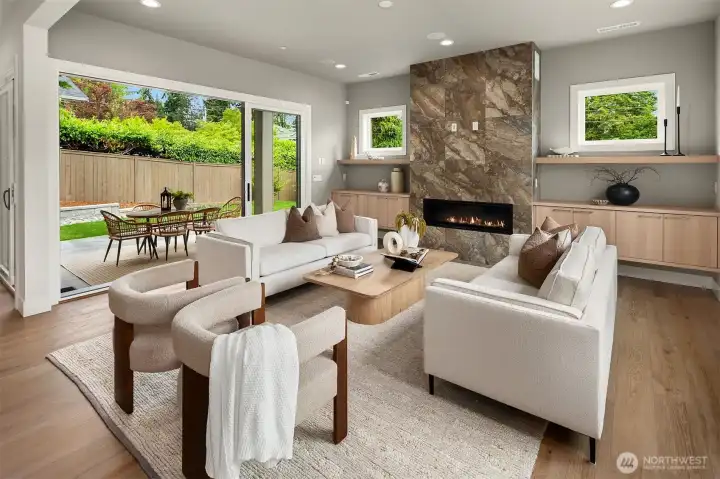 Enjoy indoor/outdoor living with multi slide doors and built in speakers in both living room and patio. Enjoy indoor/outdoor living with multi slide doors and built in speakers in both living room and patio.