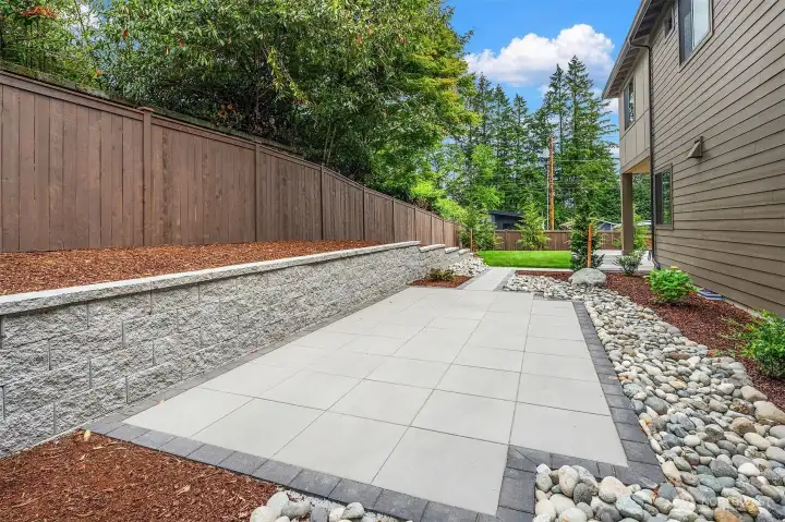 Another space to add private seating, maybe a fire pit? Room to create your own garden space in the raised area as well. Another space to add private seating, maybe a fire pit? Room to create your own garden space in the raised area as well.