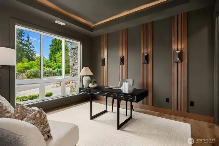A warm and elegant office space with custom lighting and millwork finishes. A warm and elegant office space with custom lighting and millwork finishes.