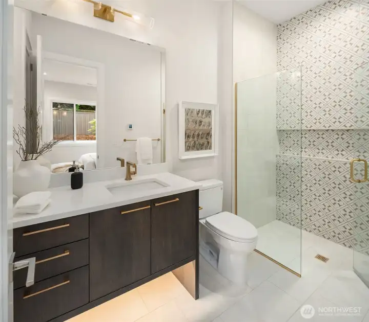 private guest bath with curb less shower and heated floors. private guest bath with curb less shower and heated floors.