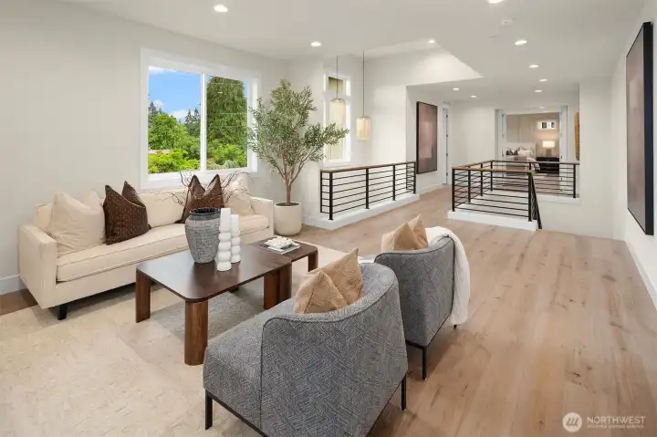 Bright, open loft area for infomal gathering. Bright, open loft area for infomal gathering.