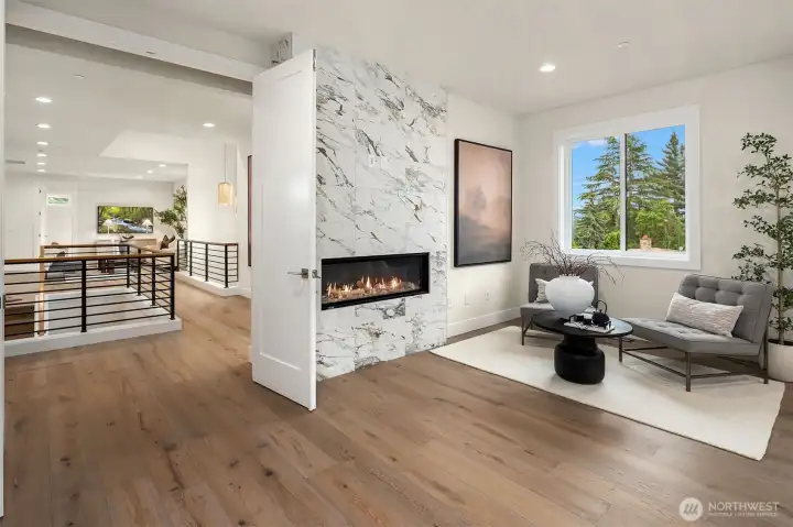 Gas fireplace and separate sitting area. Gas fireplace and separate sitting area.