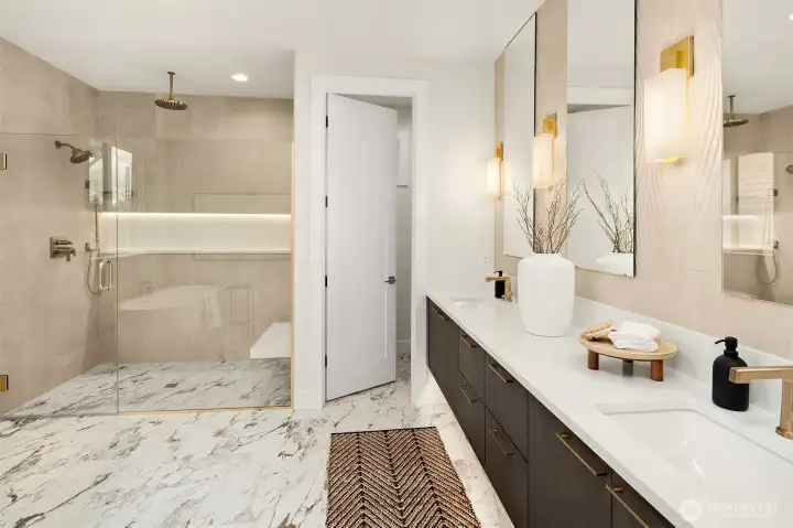 Massive walk-in shower and extensive wall tile throughout. Massive walk-in shower and extensive wall tile throughout.