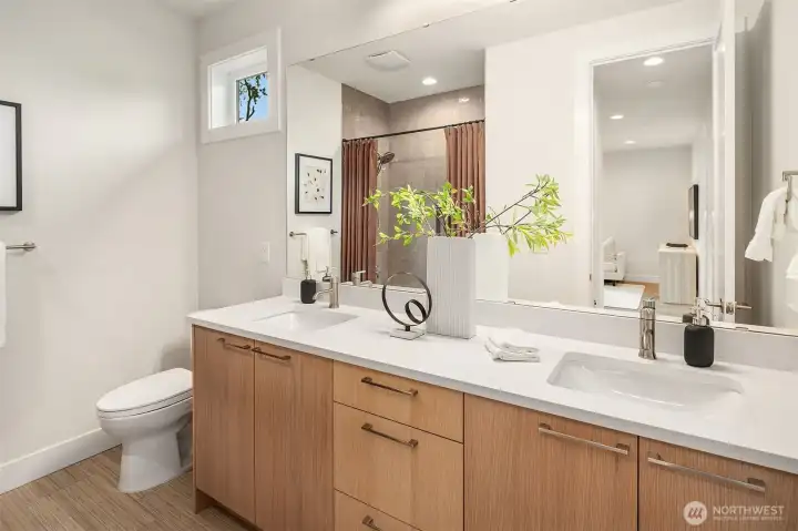 Main hall bath with tub and double vanity. Main hall bath with tub and double vanity.