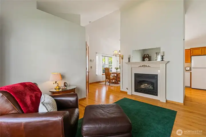 The vaulted ceilings draw your eye to the fireplace, creating a stunning centerpiece in this inviting living room. The vaulted ceilings draw your eye to the fireplace, creating a stunning centerpiece in this inviting living room.