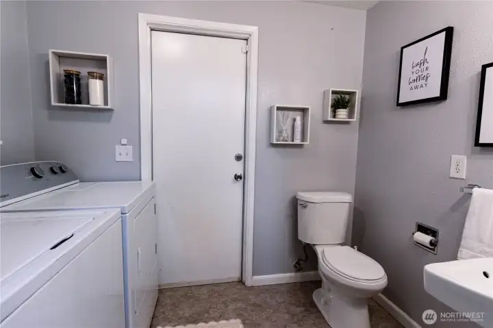 Laundry room with half bath