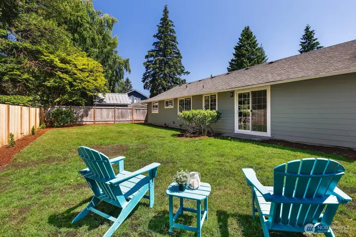 Level backyard bathing in sunlight.