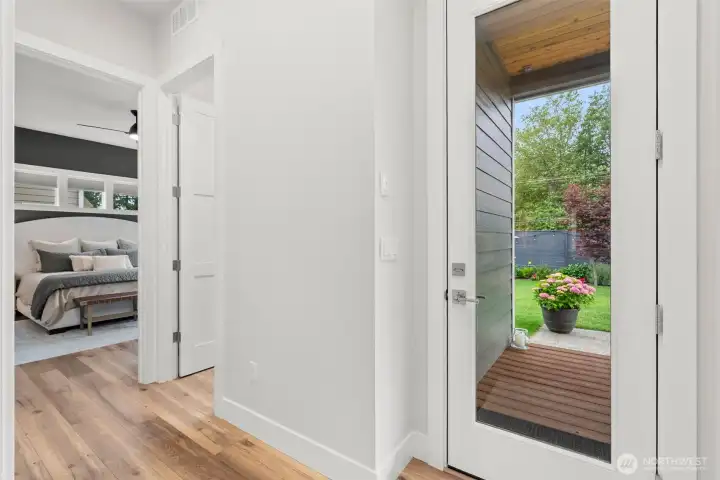Convenient laundry room located just outside the primary suite.