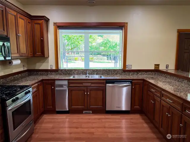 Lovely cabinetry, granite counters and stainless appliances.