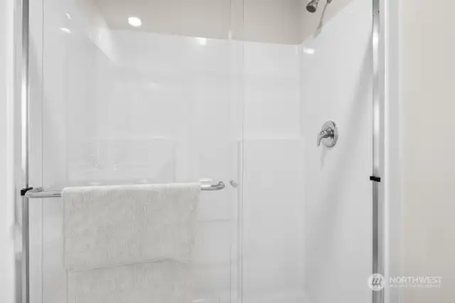 Pictures are for representational purposes only, colors and features may vary. Large walk-in shower in primary bath.