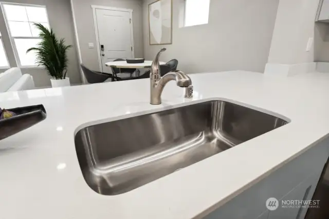 Pictures are for representational purposes only, colors and features may vary. Single basin sink in kitchen.
