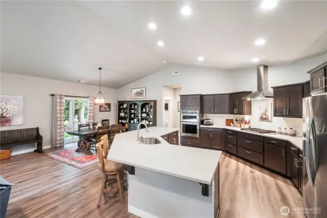 Look at the size of the granite island! Laminate floors throughout most of the home, too.
