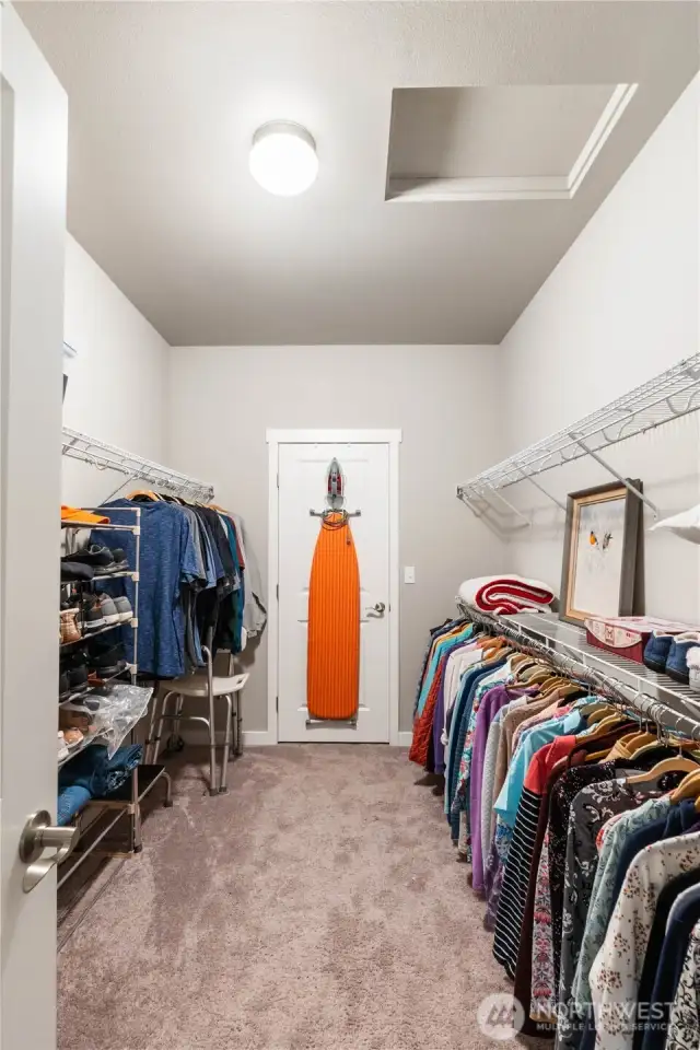 Walk-in Closet with another smaller closet through the door.