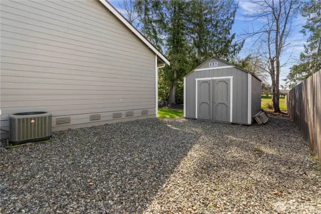 Heat Pump for heating/cooling all year long. The shed provides extra storage or create a small workshop.