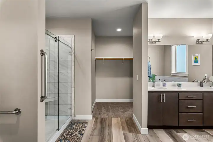 Spacious master bath with separate walk-in shower and soaking tub