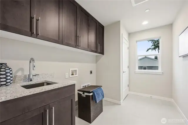 Laundry includes sink, cabinets! Photos are for representational purposes only.  Colors and options may vary.