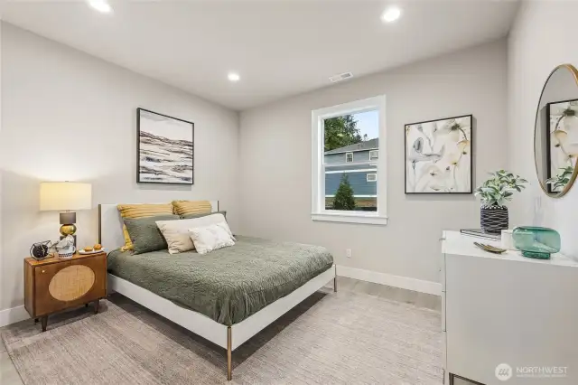 Main Floor Guest Bedroom. Photos are for representational purposes only.  Colors and options may vary.