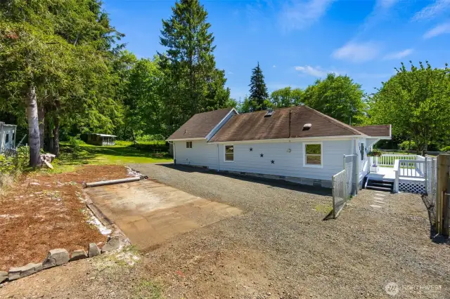Ample Parking including a Concrete pad for a Boat or recreational vehicle