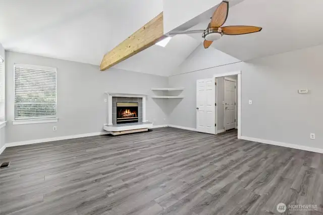 Easy to maintain vinyl plank flooring on most of the lower level living areas.