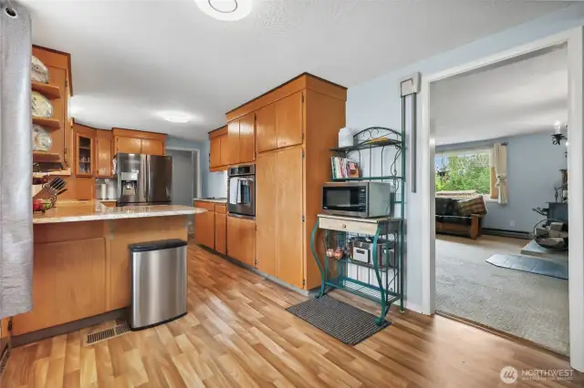 Kitchen is off the living area. Offering Granite countertops and mostly stainless steel appliances.
