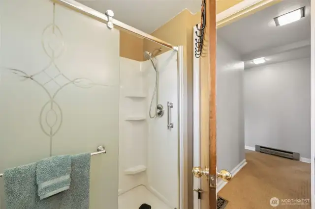 Walk-in shower in Hall bath.