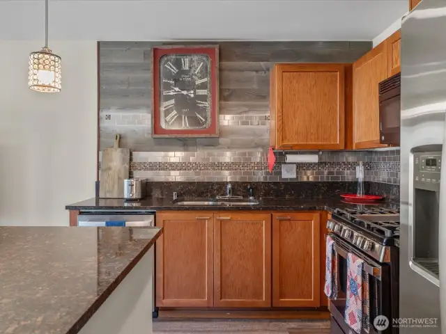 Custom back wall design and drop lighting make this a great place for entertainment.