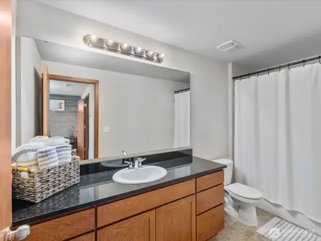 Primary bathroom, lots of space and cabinets