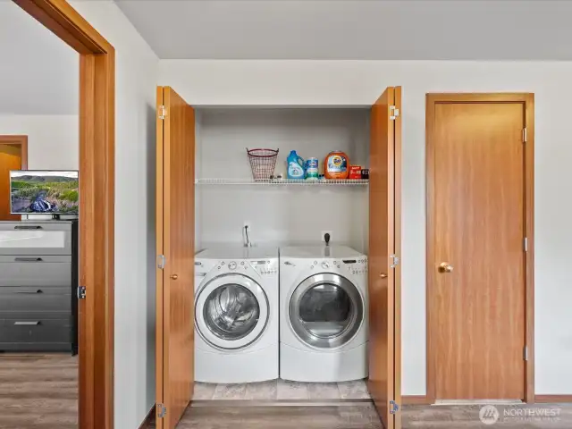Covenant upstairs laundry room and an additional storage closet.