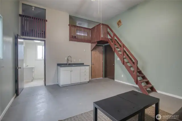 Stairs to Storage Loft above Bathroom in Garage Studio