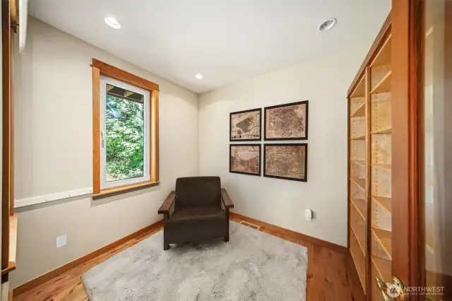Office off the living room with built in bookcases