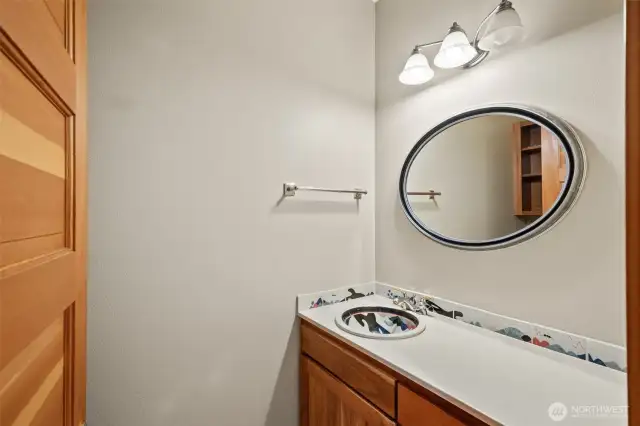 Half bath for guests with custom PNW-inspired tiles